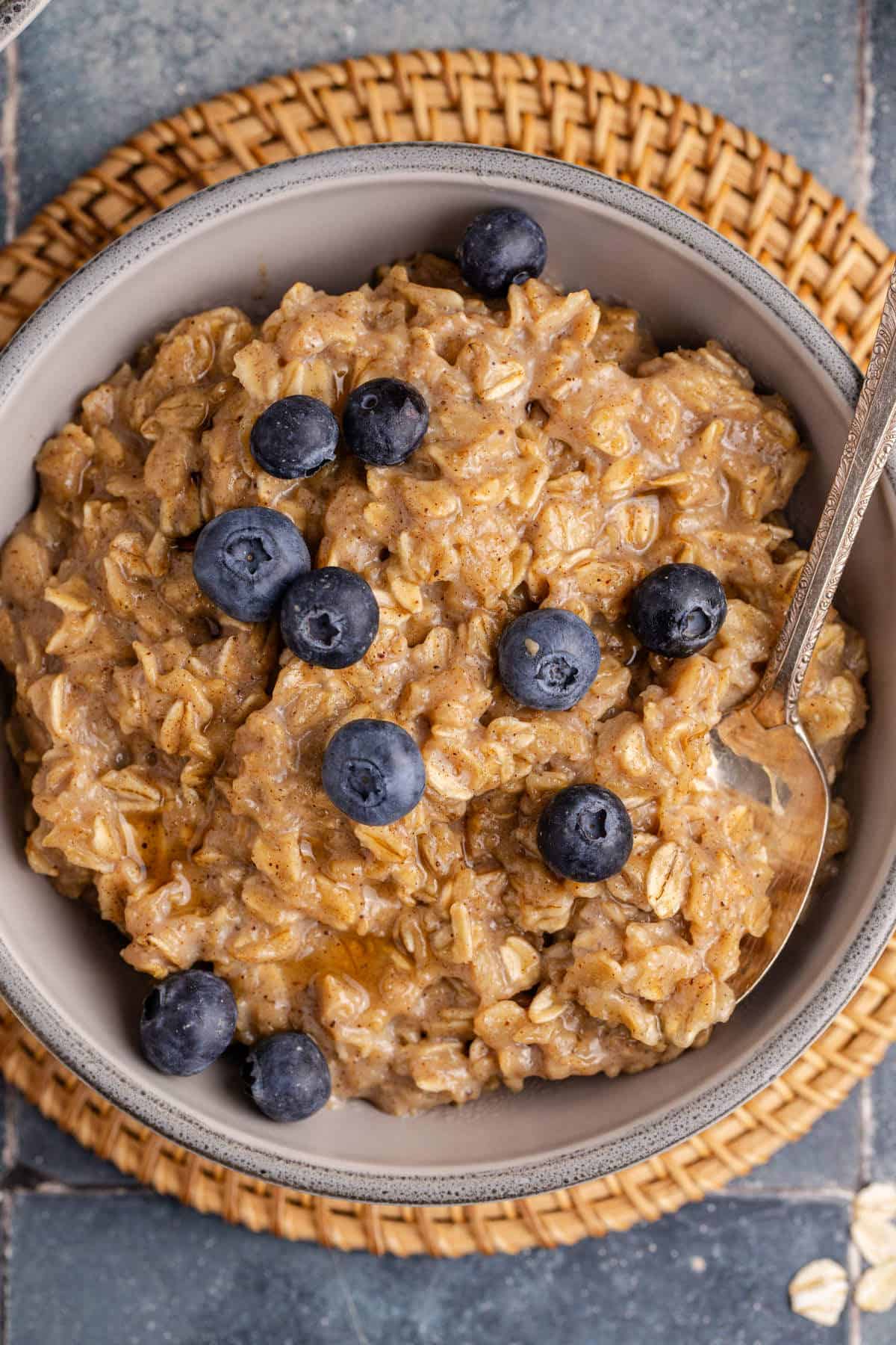 Maple Brown Sugar Oatmeal from over top with a spoon in the bowl