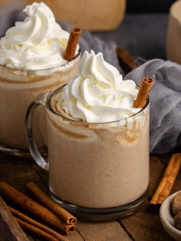Pumpkin Chai Lattes in mugs on a tray