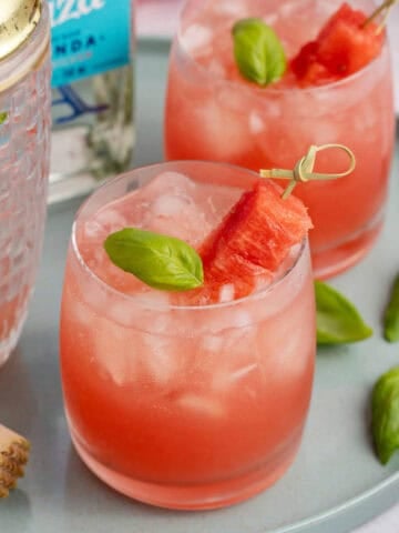 Watermelon Basil Margarita close up from above with watermelon and basil garnish