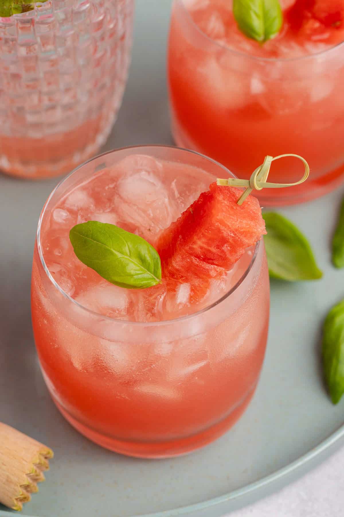 Watermelon Basil Margarita close up from above with watermelon and basil garnish