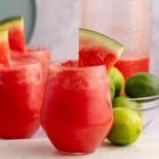 Watermelon Vodka Cocktail Served in a Stemless Wine Glass and Watermelon Wedge Garnish