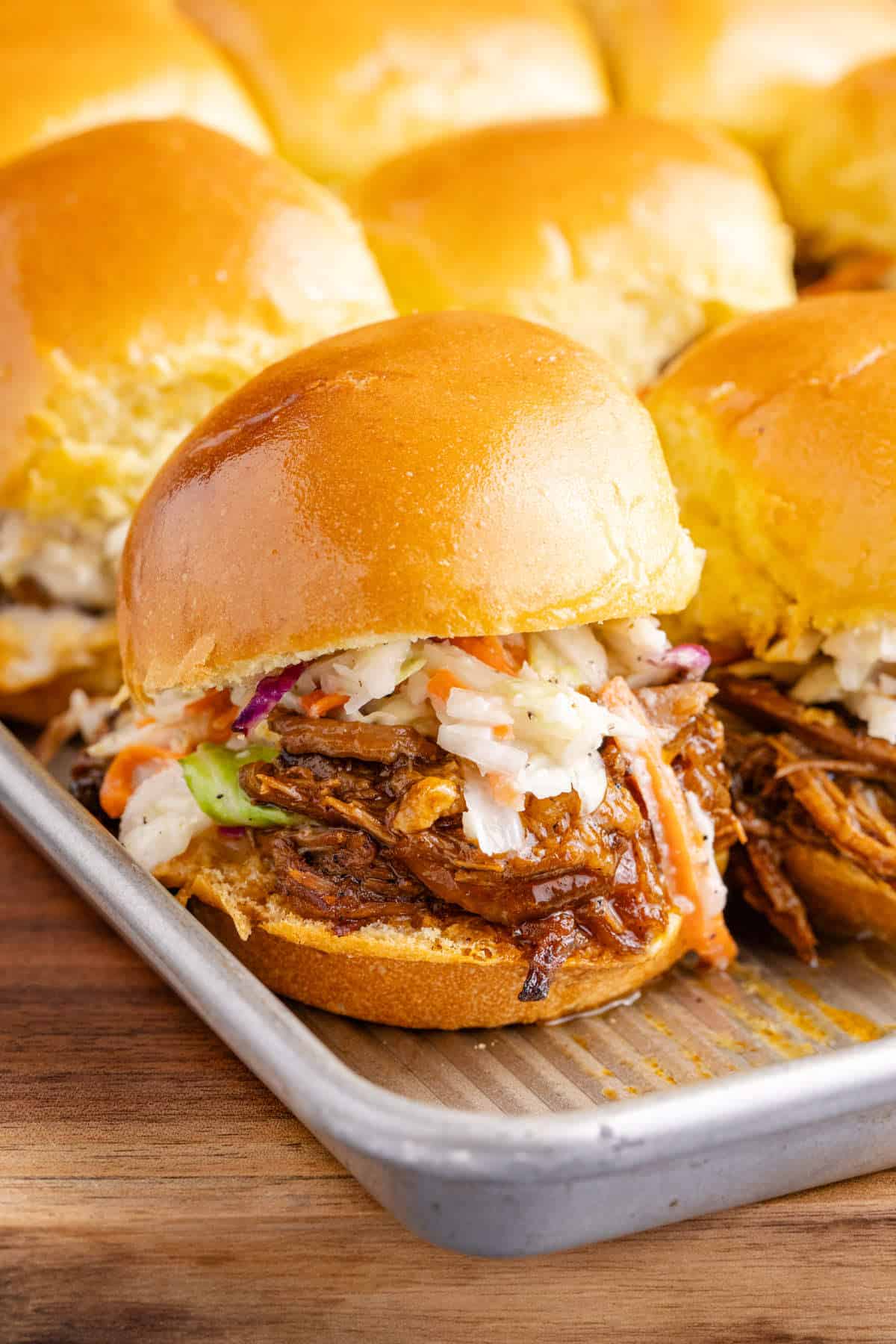 Brisket Sliders fresh from the oven on a baking sheet