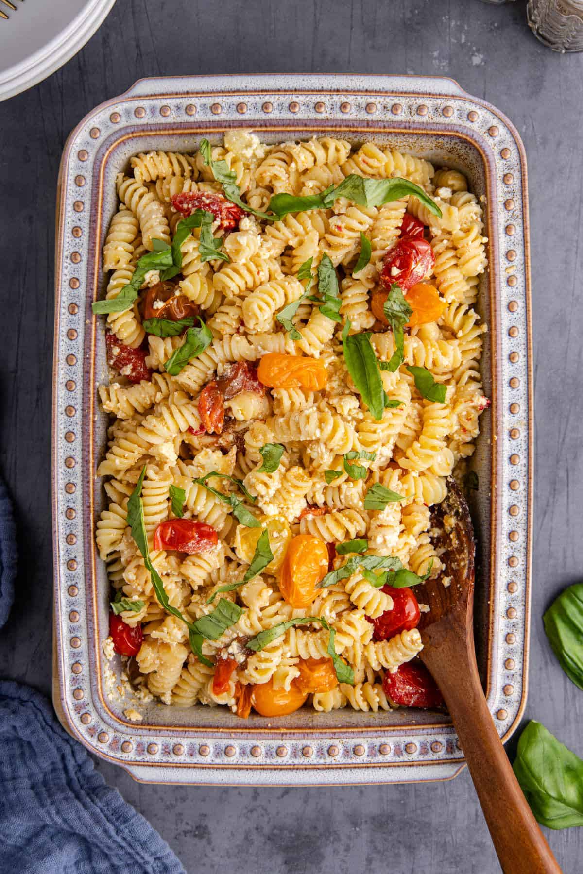 Feta Pasta Recipe Baked in Casserole Dish Topped with Fresh Basil