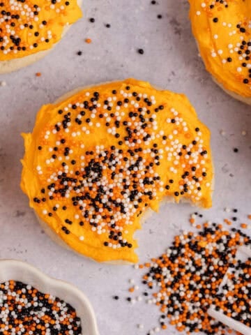 Frosted Halloween Sugar Cookies with festive sprinkles