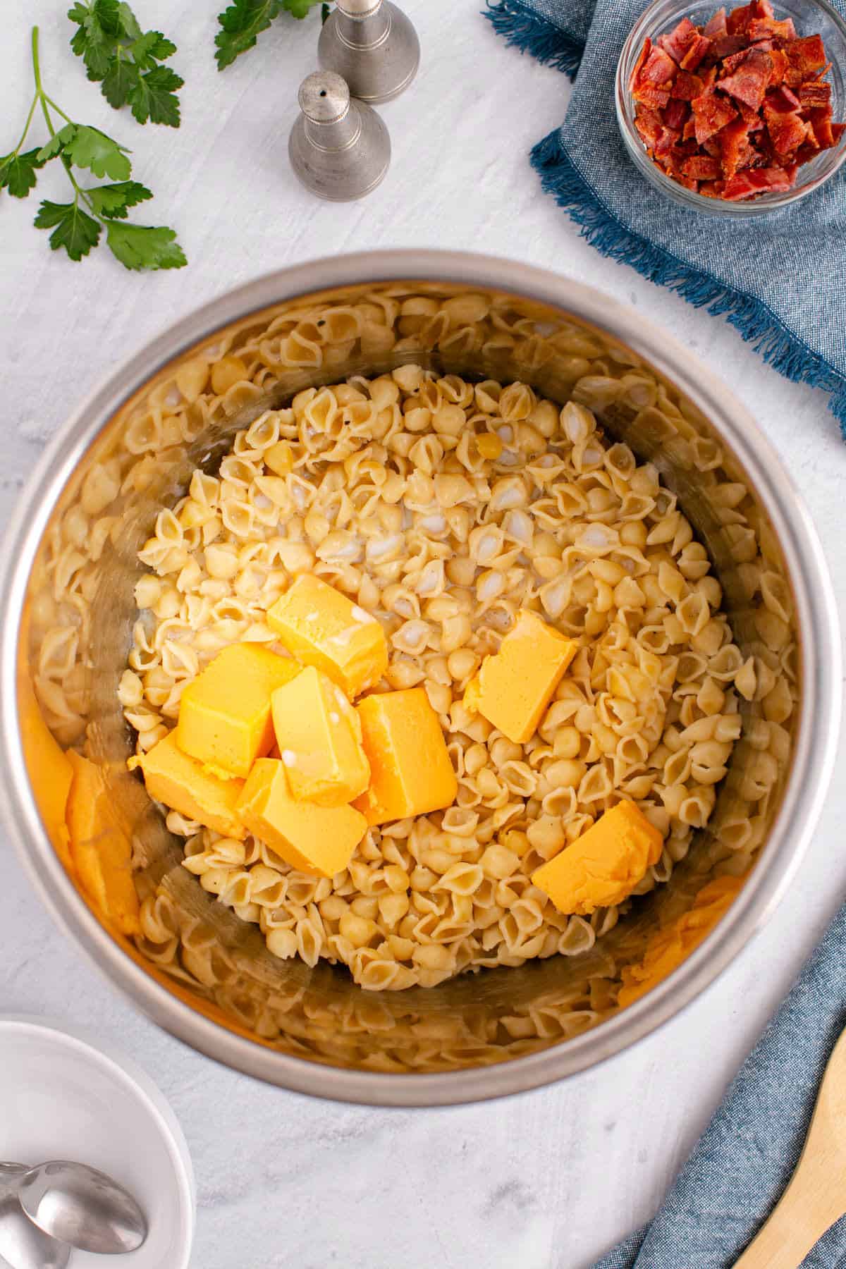 Mini Pasta Shells and Cubed Velveeta Cheese In Instant Pot