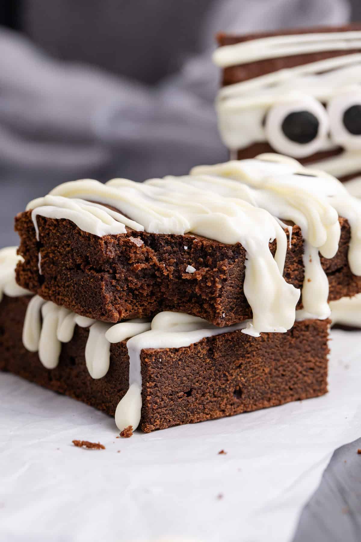 Mummy Brownies stacked with a bite taken