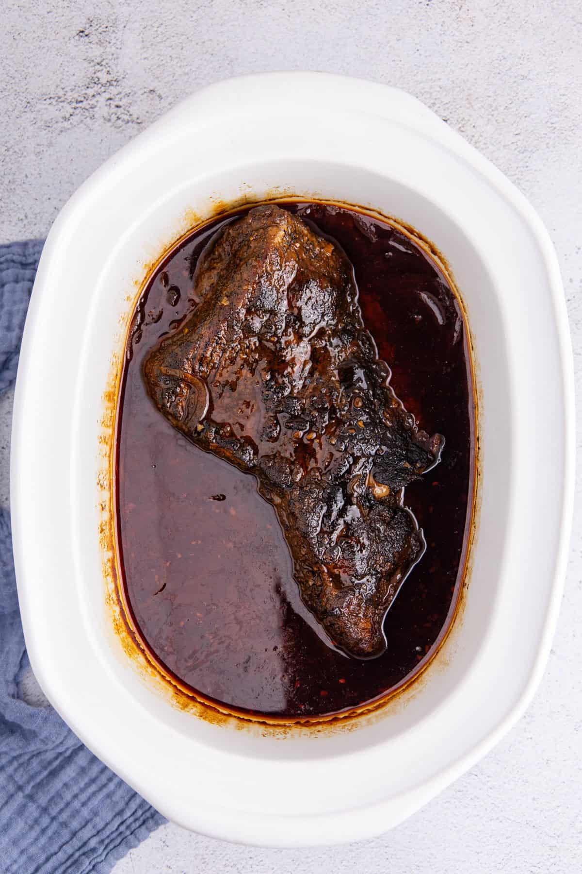 Slow Cooker Brisket cooked in the Crockpot base