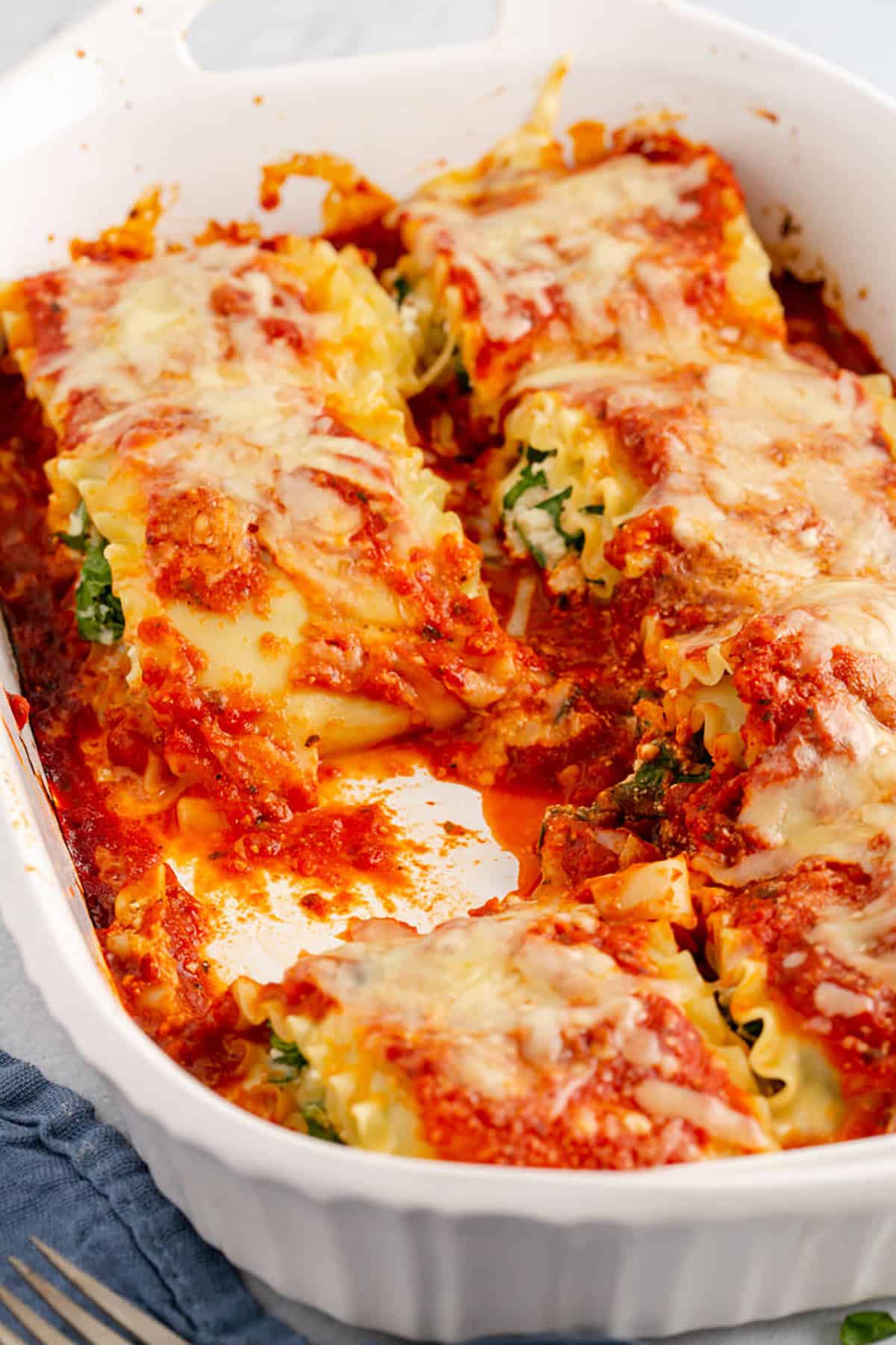 Spinach Lasagna Roll Ups Baked in a Casserole Dish
