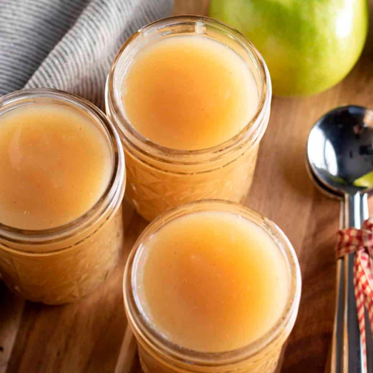 Apple Sauce in jars on a counter