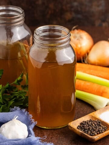 Crock Pot Vegetable Stock with veggies all around