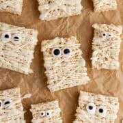 Mummy Rice Krispie Treats decorate with white chocolate and candy eyeballs