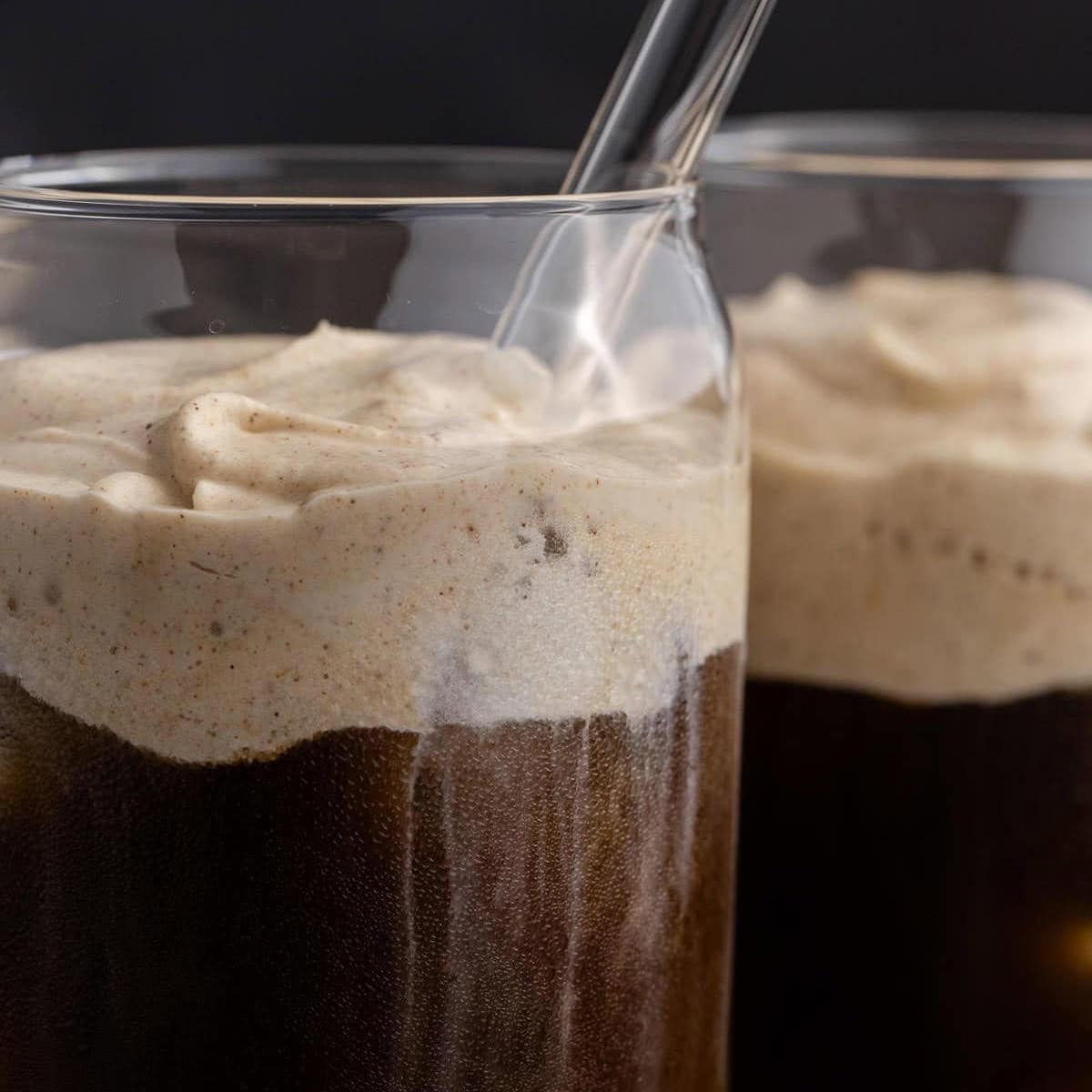 Pumpkin Cold Foam made into an iced latte close up in glasses