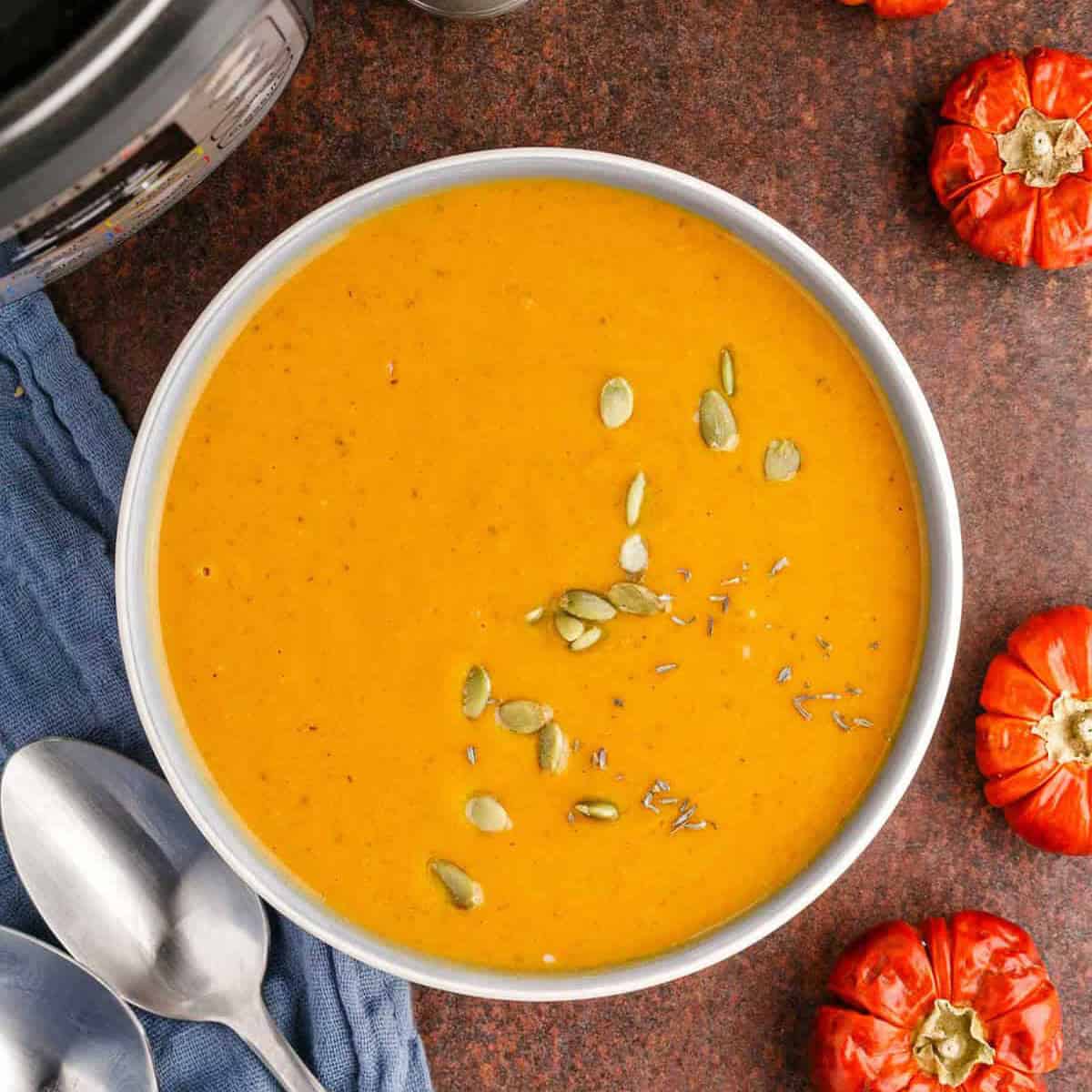 Instant Pot Pumpkin Soup in a bowl on a counter