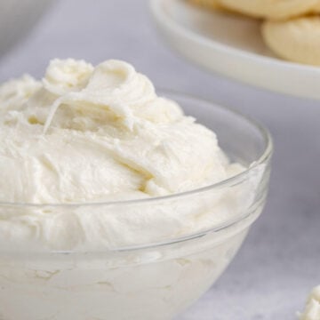 Buttercream Frosting for Sugar Cookies in a Small Glass Bowl Close Up