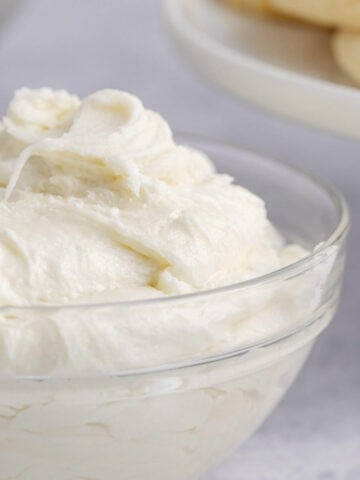 Buttercream Frosting for Sugar Cookies in a Small Glass Bowl Close Up