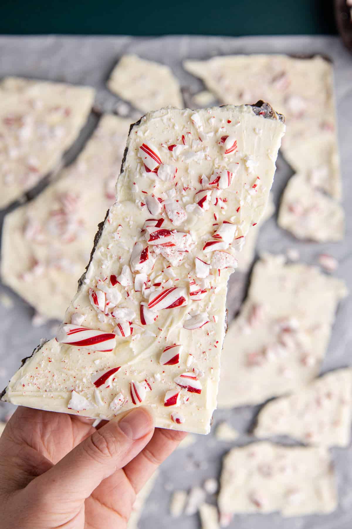 Costco Peppermint Bark being picked up from above