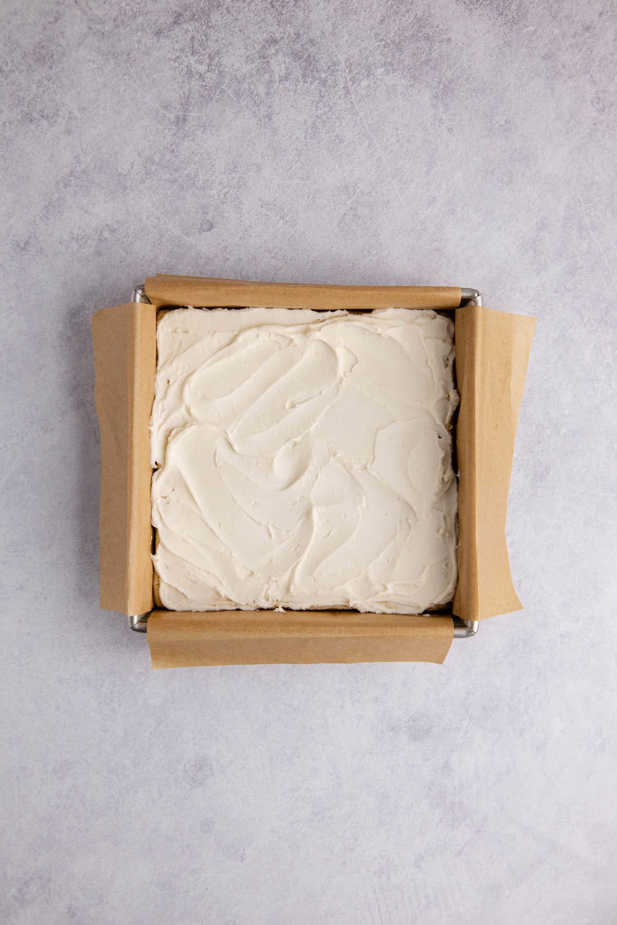 Frosted Sugar Cookie Bars frosted in pan