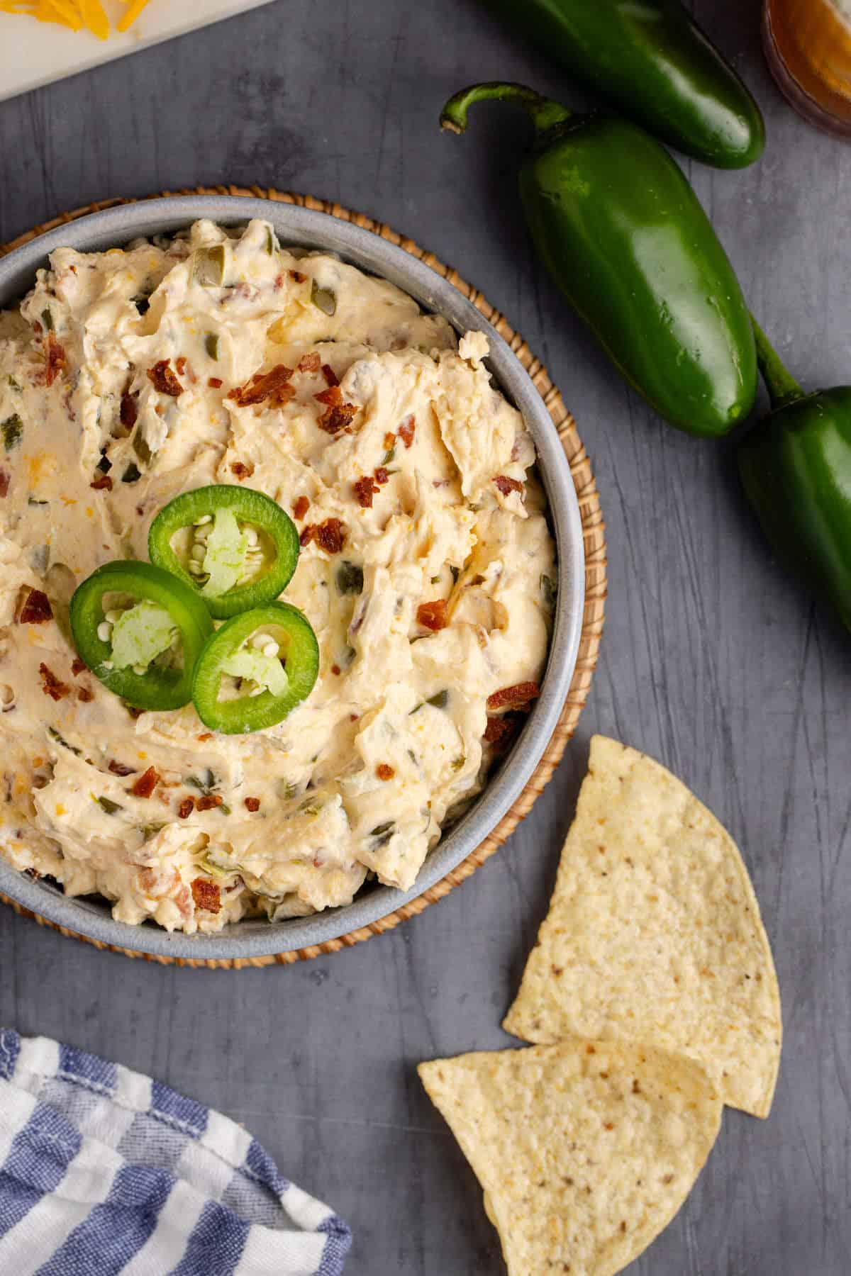 Jalapeno Cream Cheese Dip in a Serving Bowl Garnished with Fresh Sliced Jalapeños