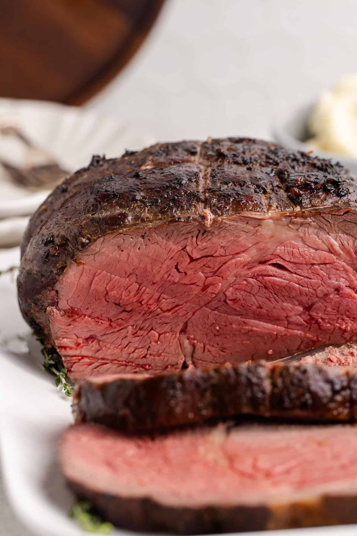 Reverse Sear Beef Tenderloin profile shot of a slice to see the medium rare cook