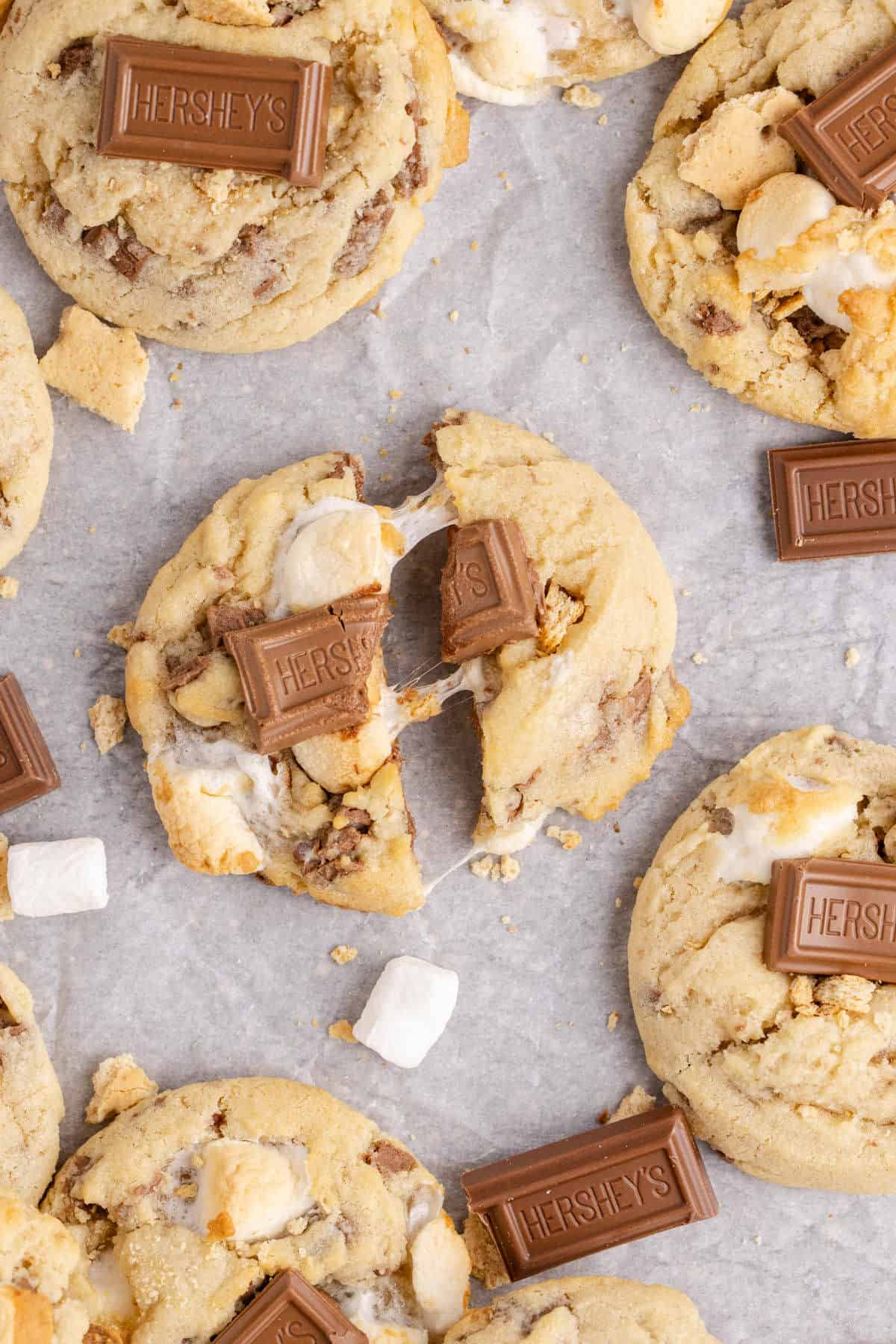 Smores Cookies from above broken in half with gooey marshmallows