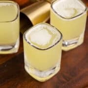 Tic Tac Shots in Shot Glasses on a Wooden Tray from above