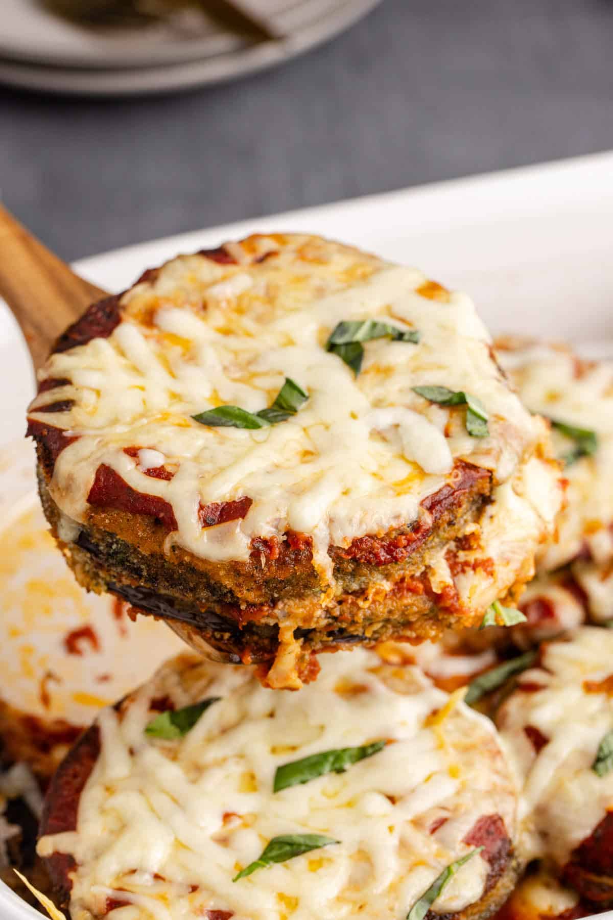 Eggplant Casserole piece being served from a spatula