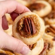 Mini Pecan Pie being picked up, close up