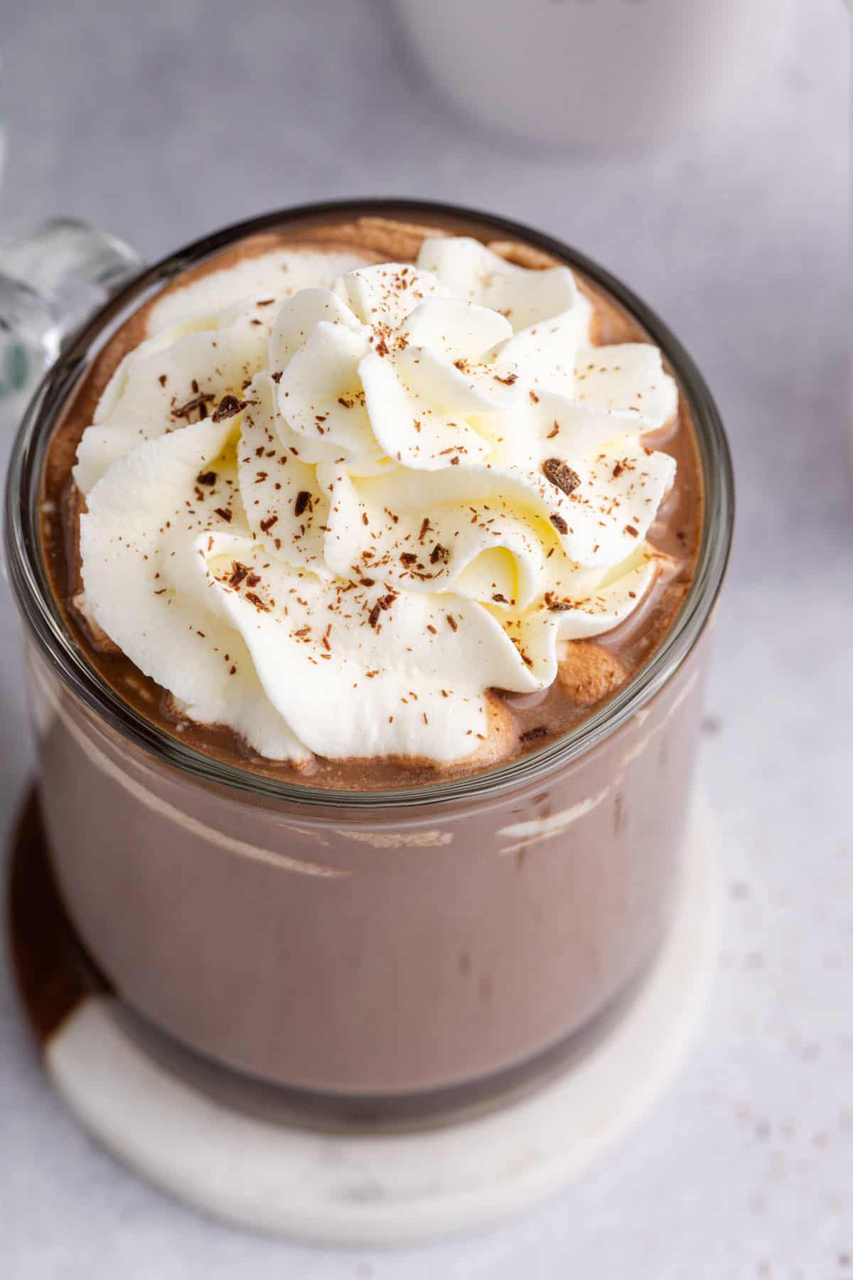 Starbucks Peppermint Hot Chocolate in a mug with whipped cream and chocolate shavings from above