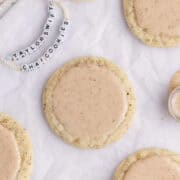 Taylor Swift Chai Cookies on parchment paper with friendship bracelets