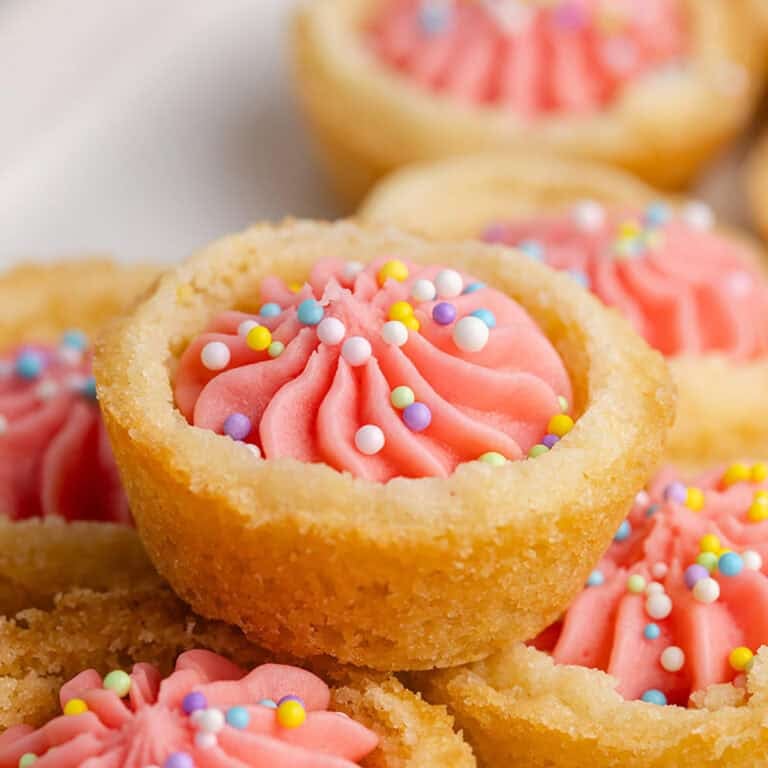 Easter Sugar Cookie Cups stacked on a platter