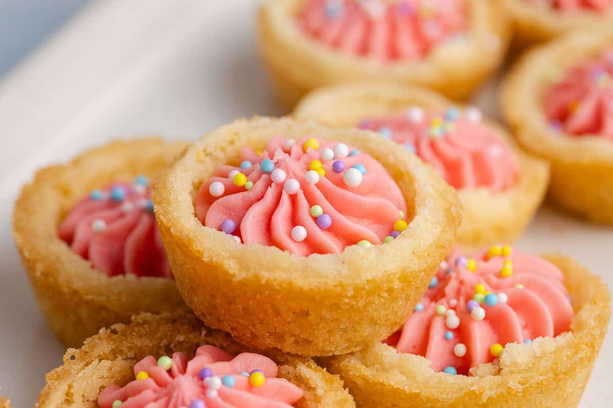 Easter Sugar Cookie Cups stacked on a platter