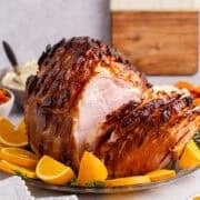 Honey Ham on a platter partially sliced