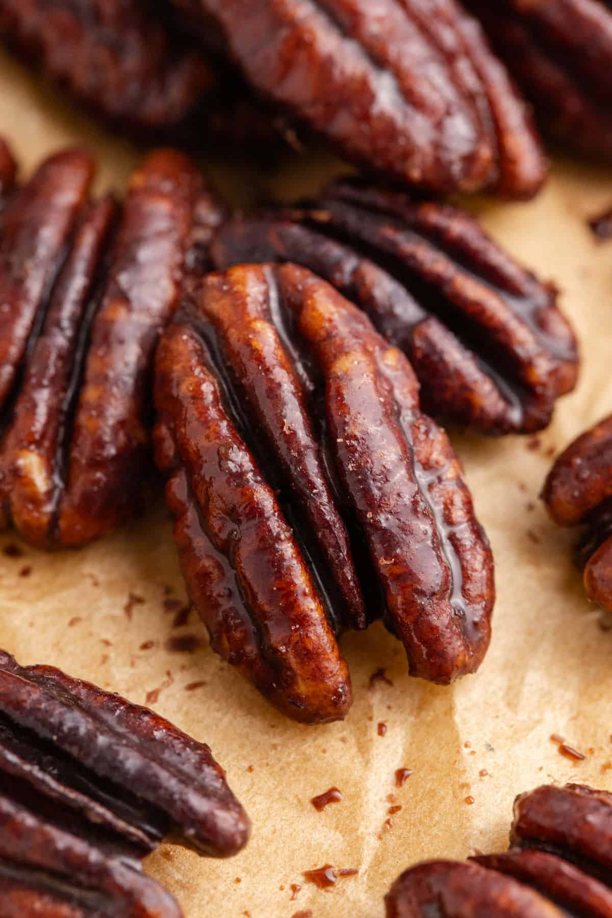 Close Up of Keto Candied Pecans on Parchment Paper