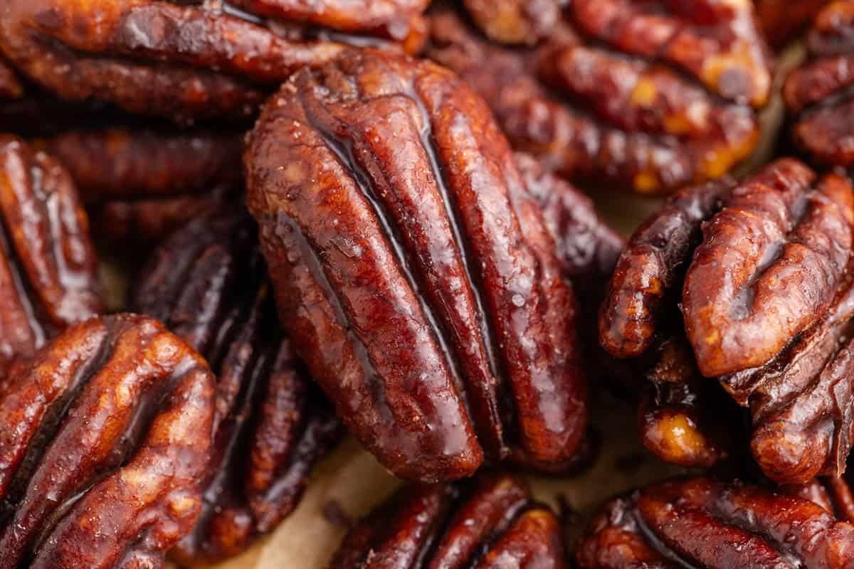 Close Up of Keto Candied Pecans on Parchment Paper