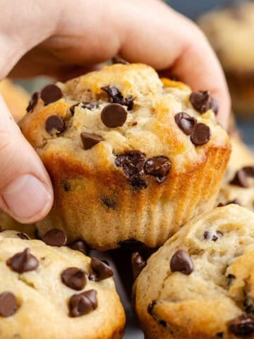 Peanut Butter Banana Muffins with one being taken