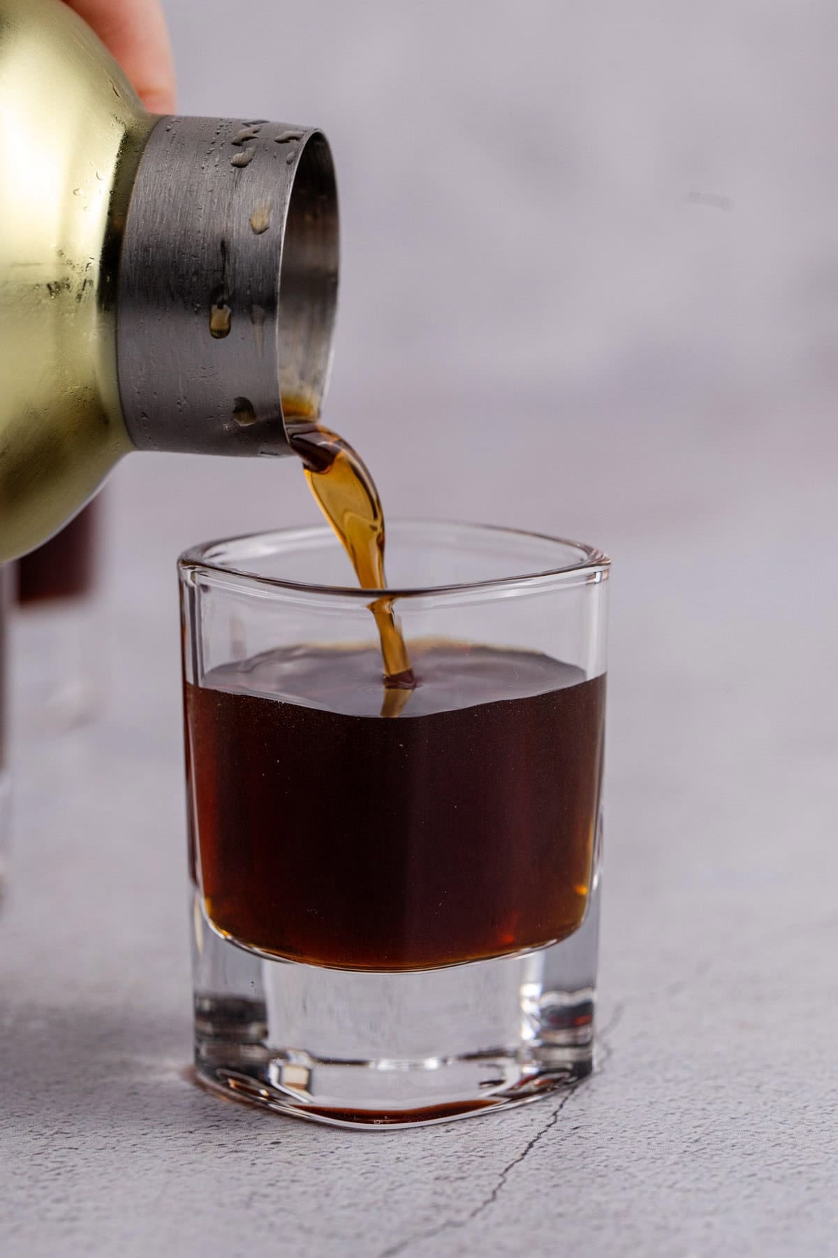 Peanut Butter Shot being poured into a shot glass
