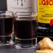 Peanut Butter Shot up with a spoonful of peanut butter beside