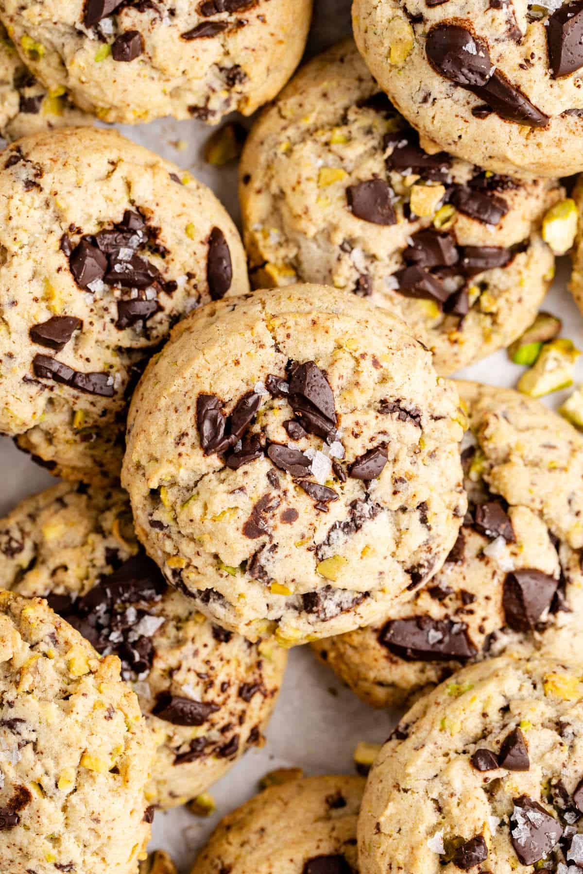 Pistachio Chocolate Chip Cookies stacked on top of each other