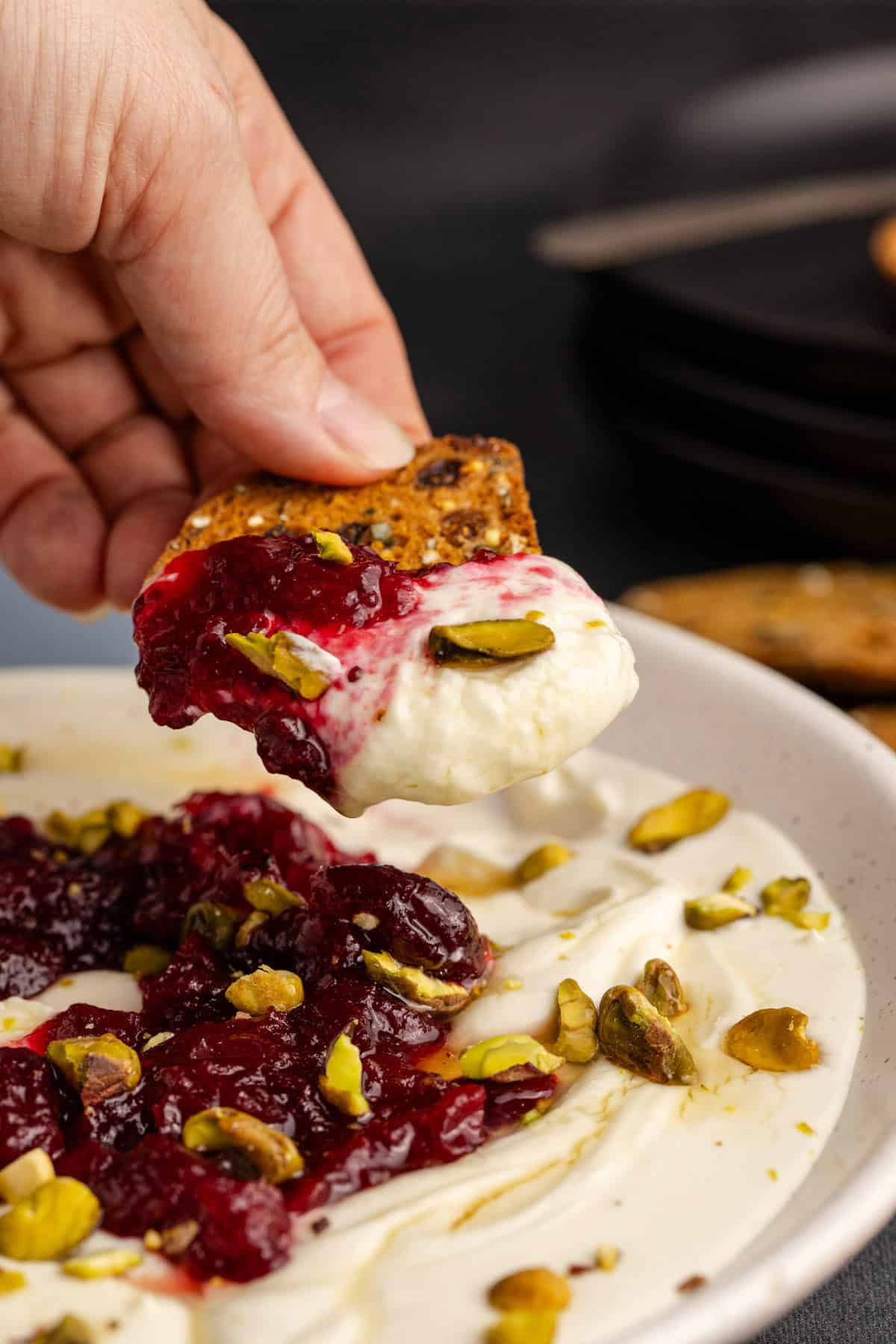Whipped Goat Cheese close up of a scoop on a cracker