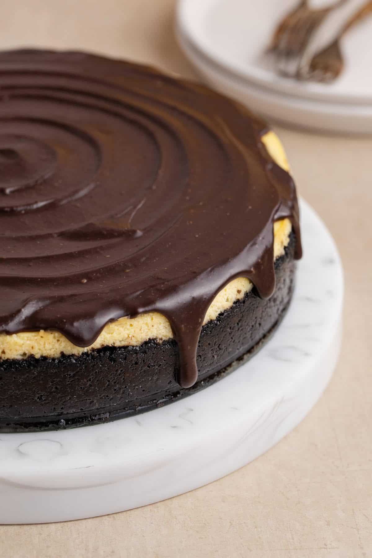 Baileys Cheesecake up close to see the ganache dripping