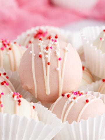 Vanilla Oreo Truffles piled on a plate up close