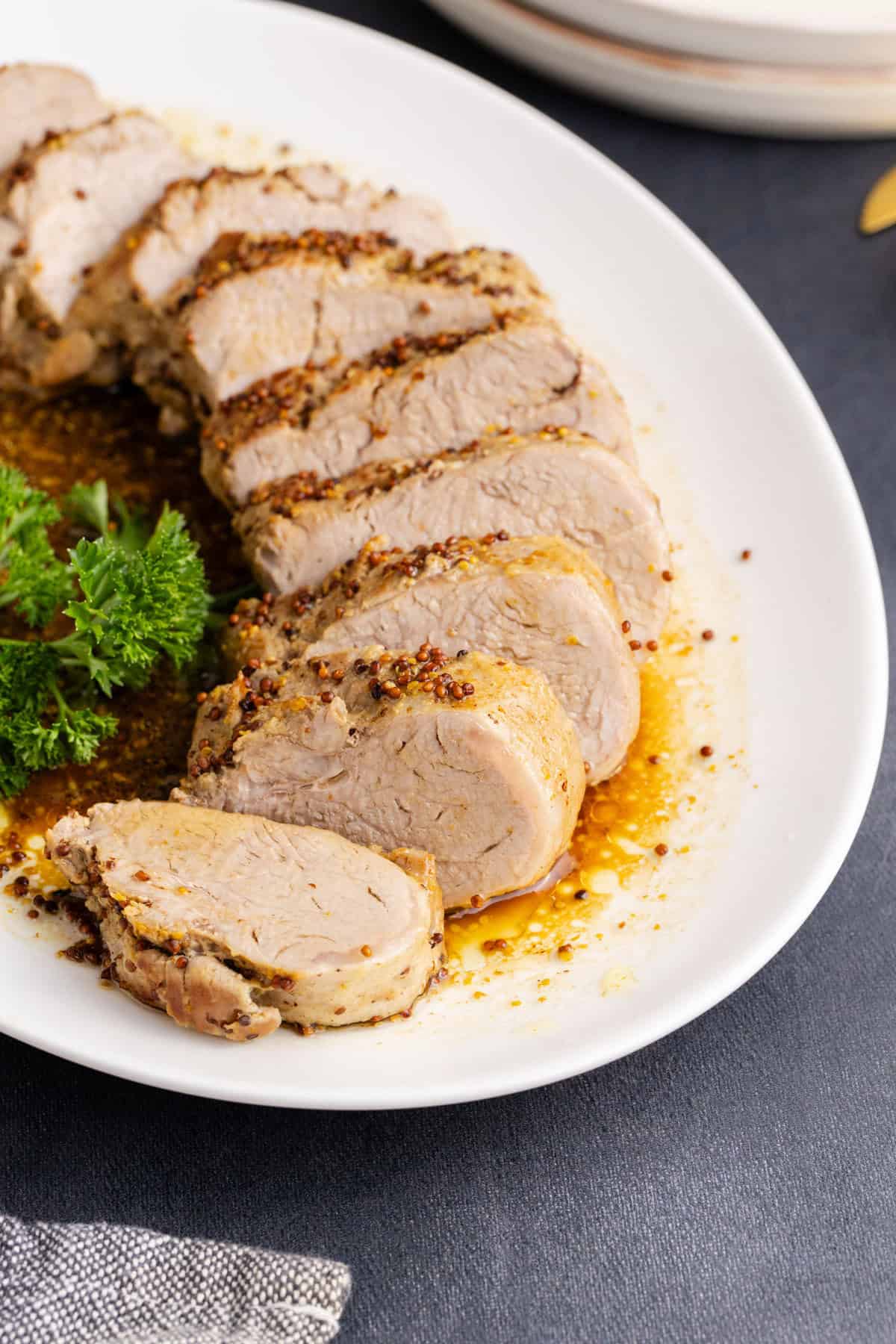 Instant Pot Pork Tenderloin sliced on a platter