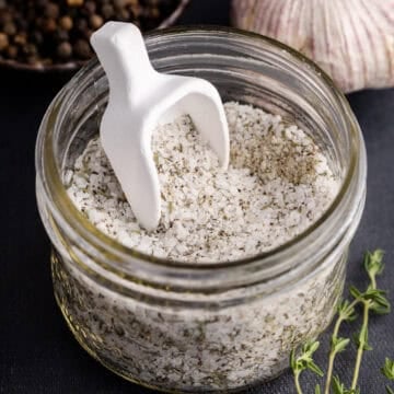 Prime Rib Rub in a mason jar with a little serving spoon
