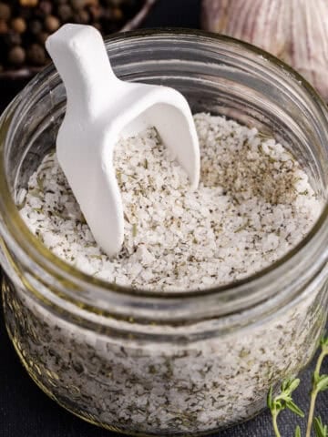 Prime Rib Rub in a mason jar with a little serving spoon