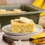 Banana Cornbread on a plate with slices of banana on top