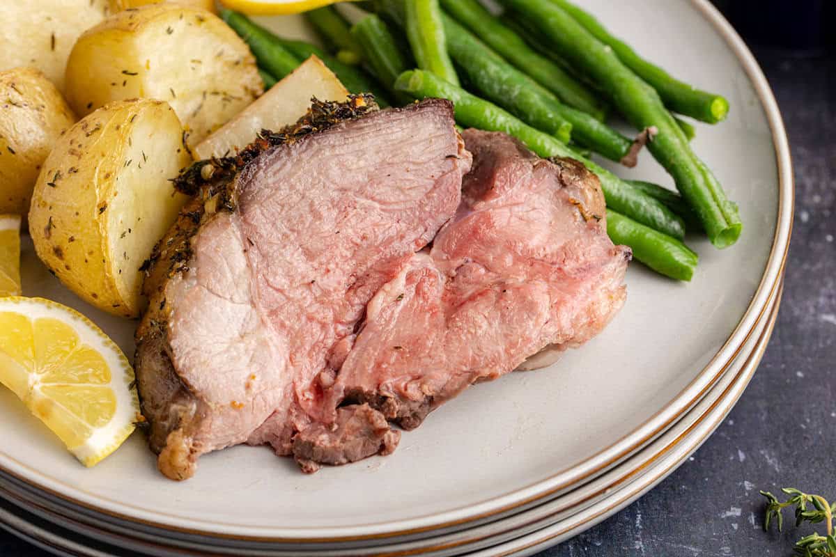 Roast Leg of Lamb slice on a plate with vegetables