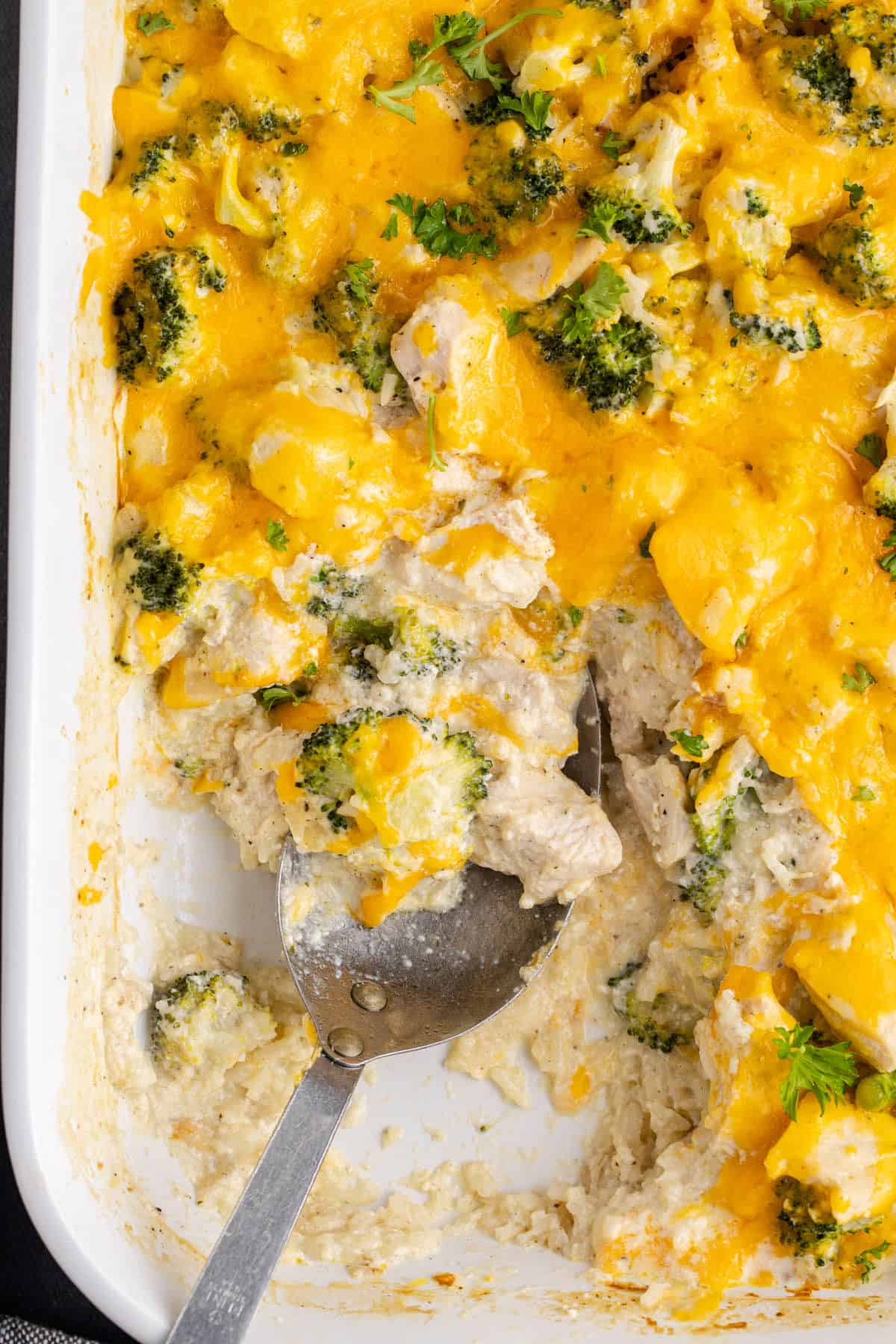 Chicken Broccoli Casserole with Rice from above in the baking dish with a spoon taken