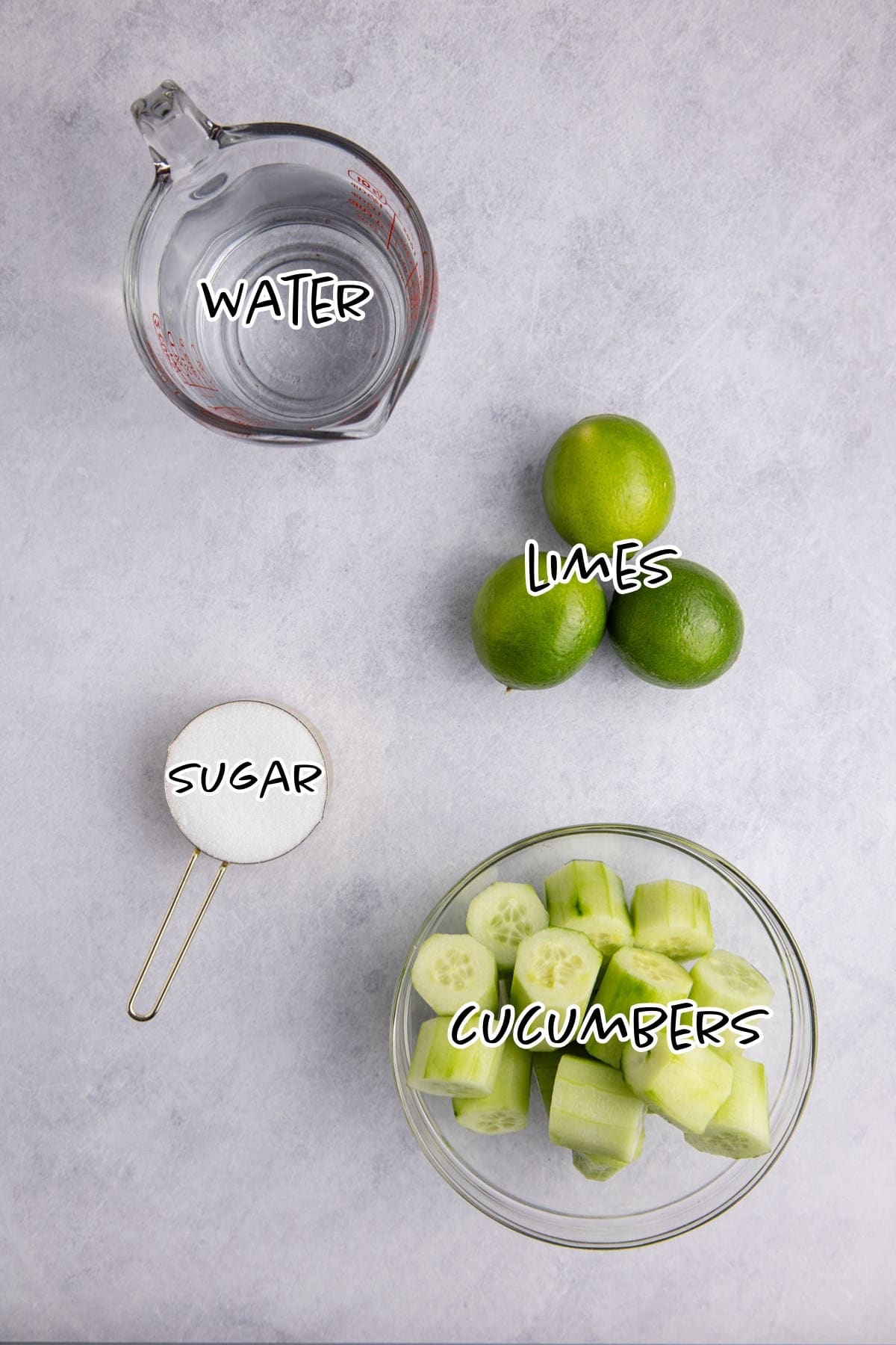 Cucumber Agua Fresca ingredients on a counter