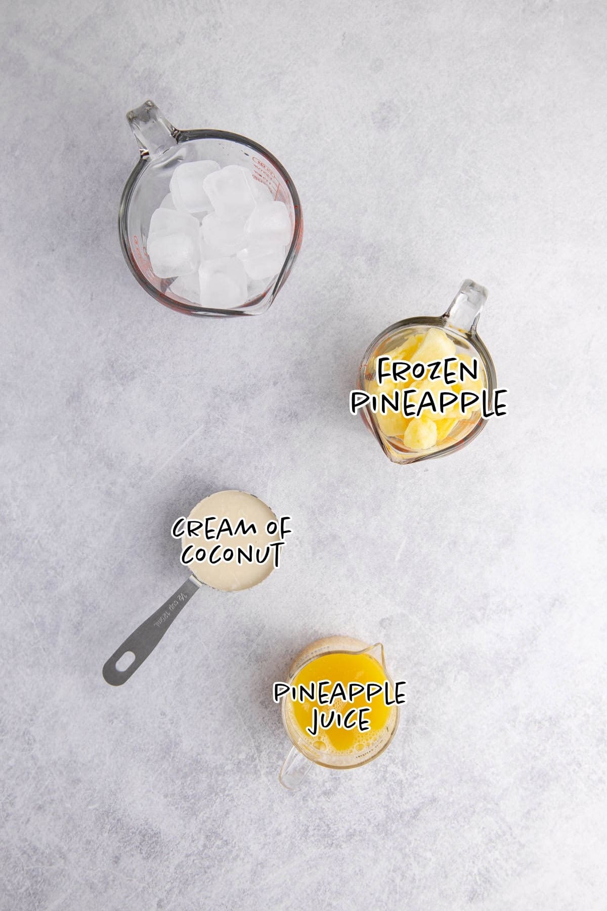 Non-Alcoholic Pina Colada ingredients on a Counter