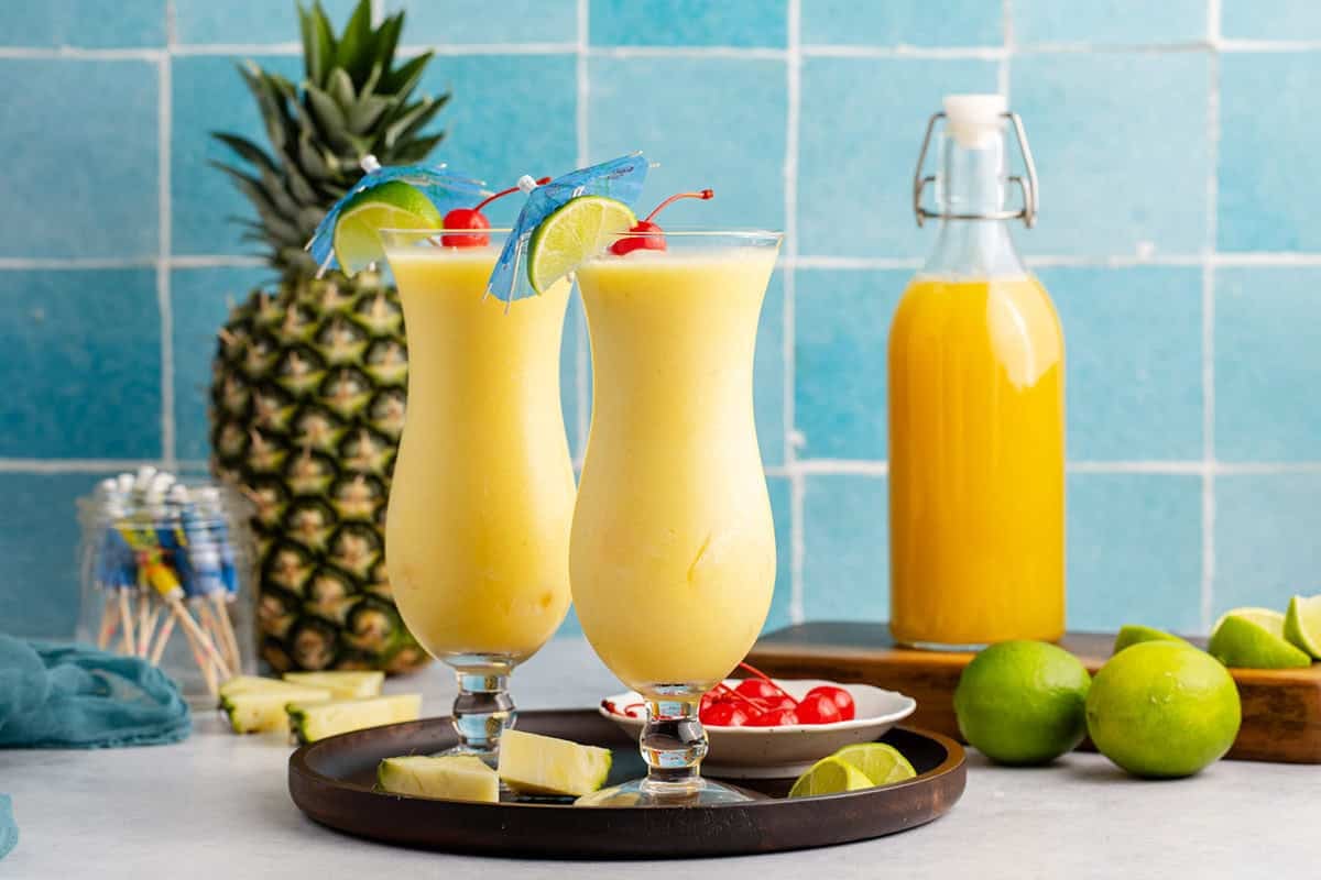 Two Non Alcoholic Frozen Pineapple Daiquiris on a tray